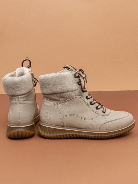 Зимові жіночі черевики Rieker 74205/60 бежеві екошкіра фото