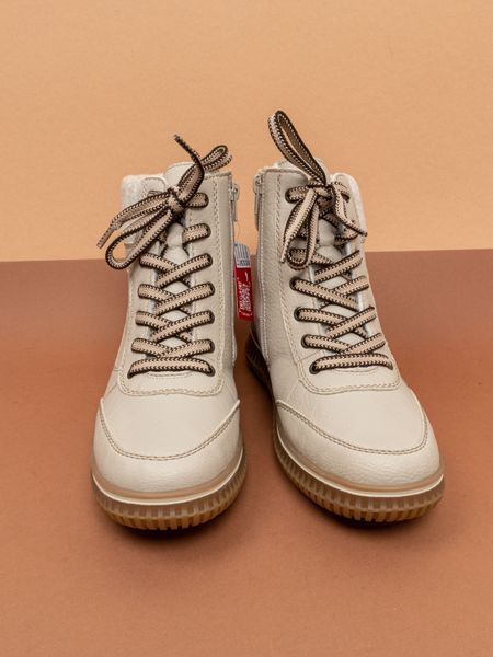 Зимові жіночі черевики Rieker 74205/60 бежеві екошкіра фото