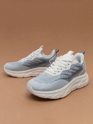 Жіночі кросівки Fashion 5669 білі/сині текстильні фото