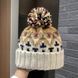 Зимова шапка з помпоном в корейському стилі Fashion бежево-біла 56-58 фото 1