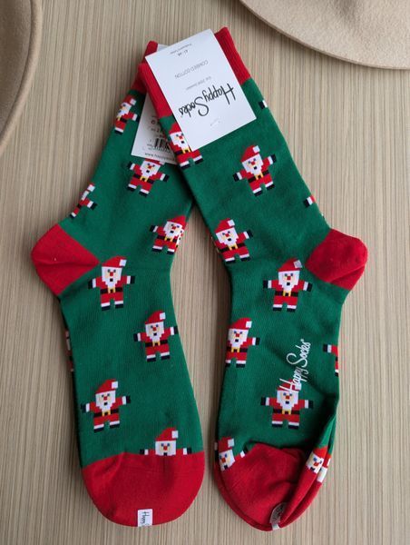 Святкові чоловічі шкарпетки Happy Socks зелені Санта демісезонні фото