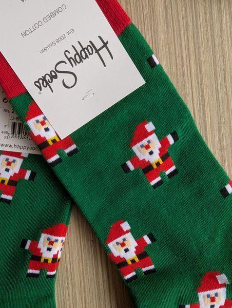Святкові чоловічі шкарпетки Happy Socks зелені Санта демісезонні фото